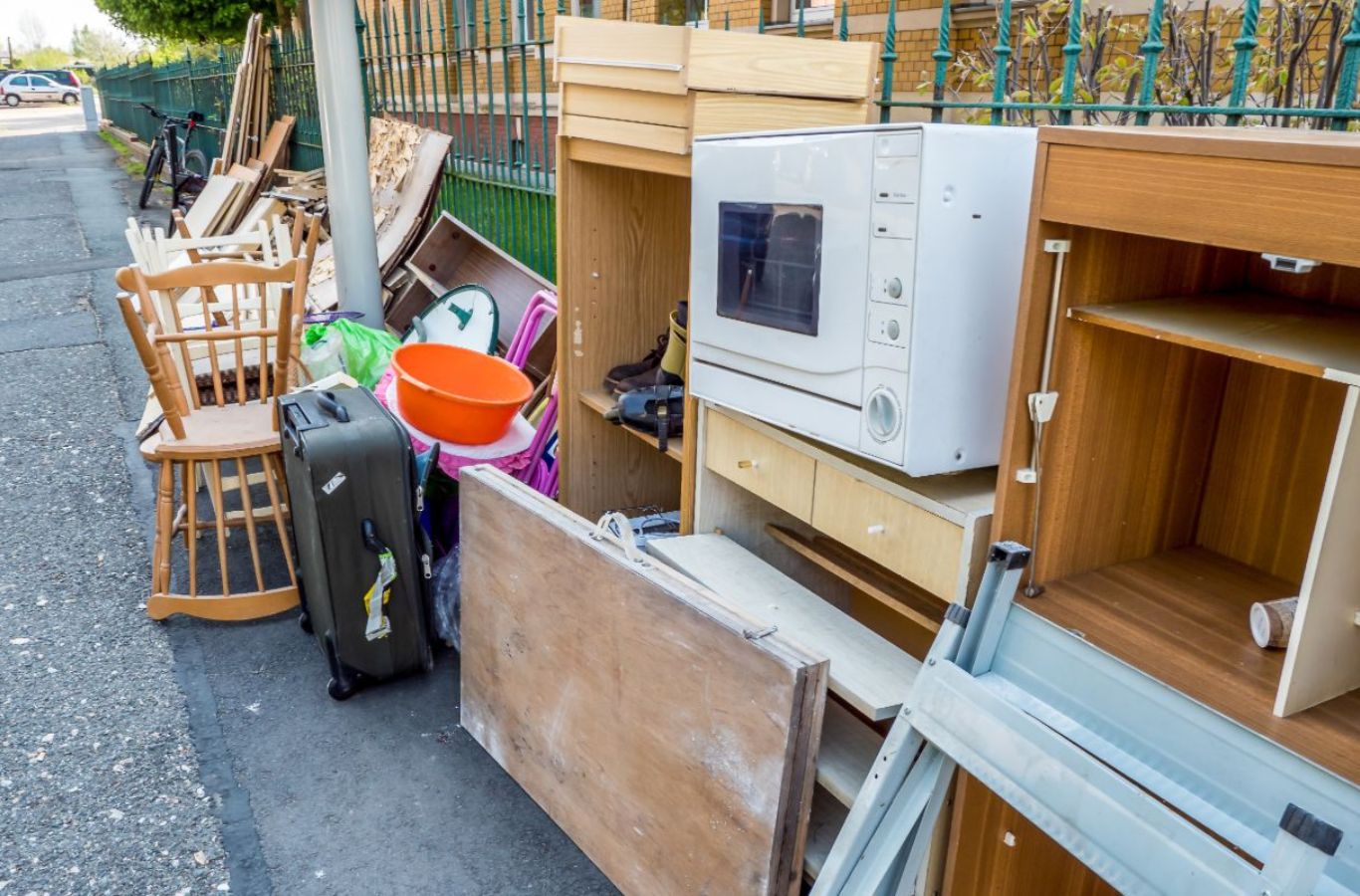 A satisfied customer enjoying clutter-free living after BE&P Services’ eco-friendly junk removal in West Springs, AB.